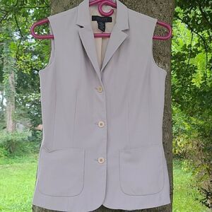 The limited Cream colored vest